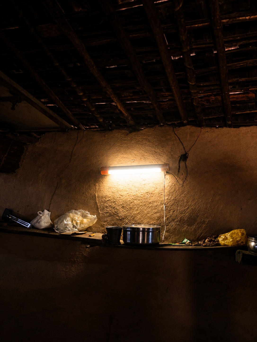 Solar light illuminating rural home interior